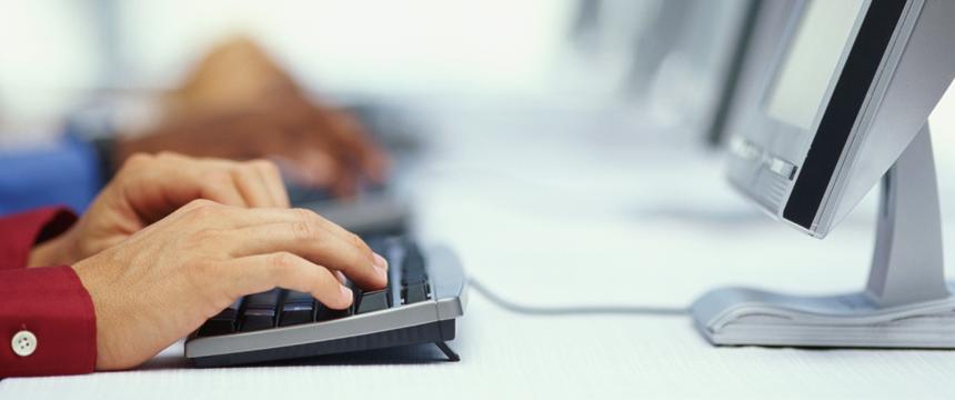 hands on a computer keyboard